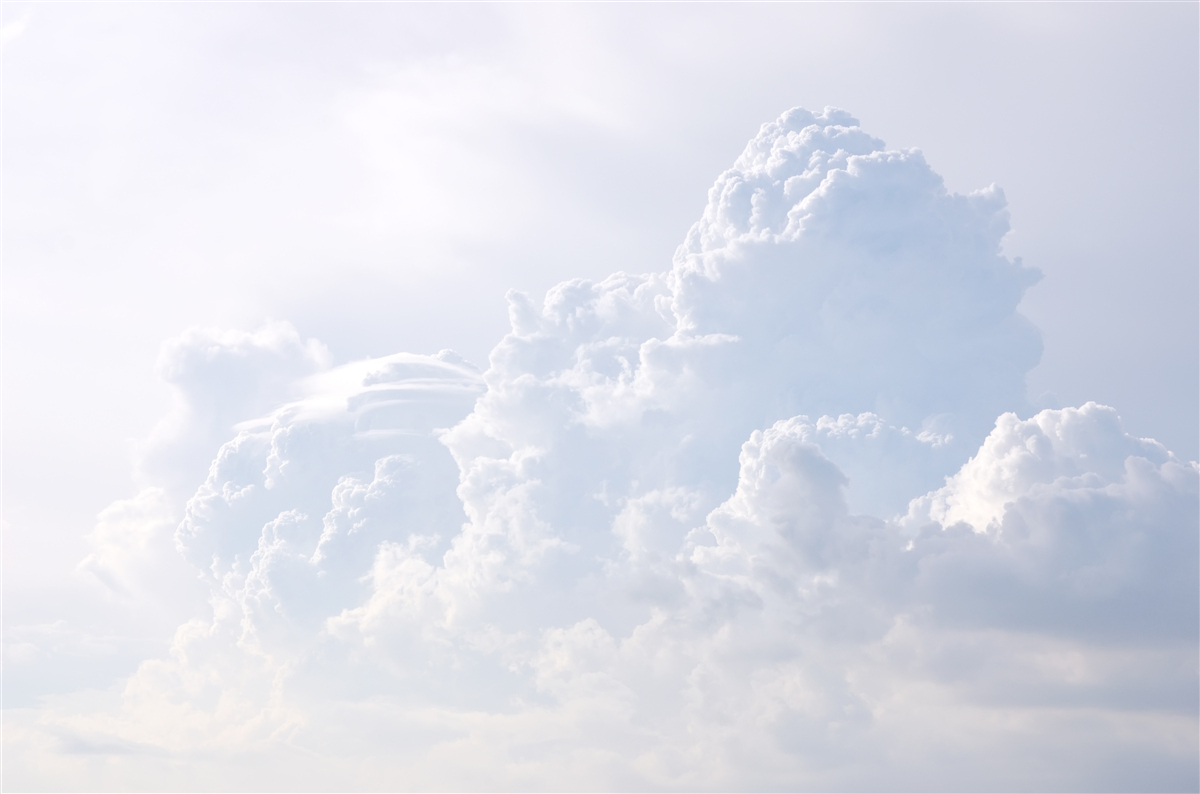 Fototapeten Flauschige Schneewolken