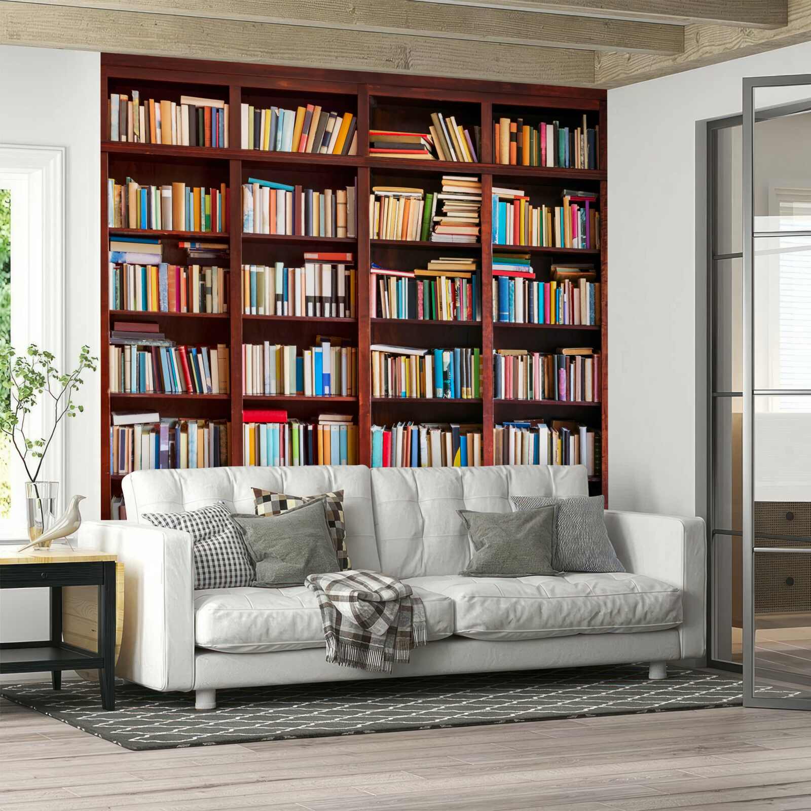 Fototapeten Bücherreihen in verschiedenen Farben in den Regalen