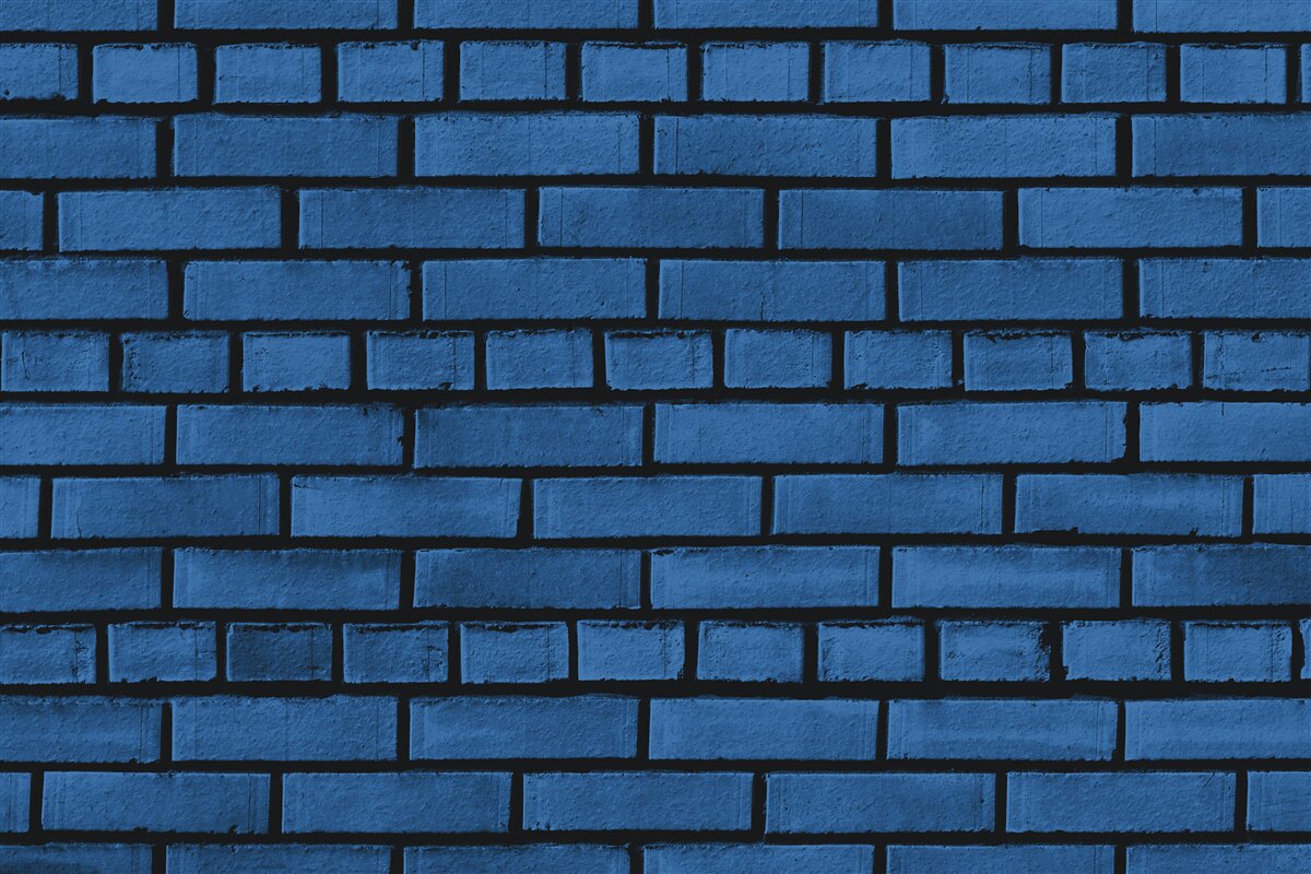 Fototapeten Die Wand besteht aus dunkelblauem Ziegelstein