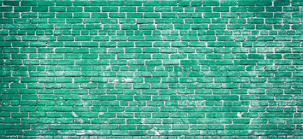 Fototapeten Eine Wand aus türkisfarbenen Ziegeln