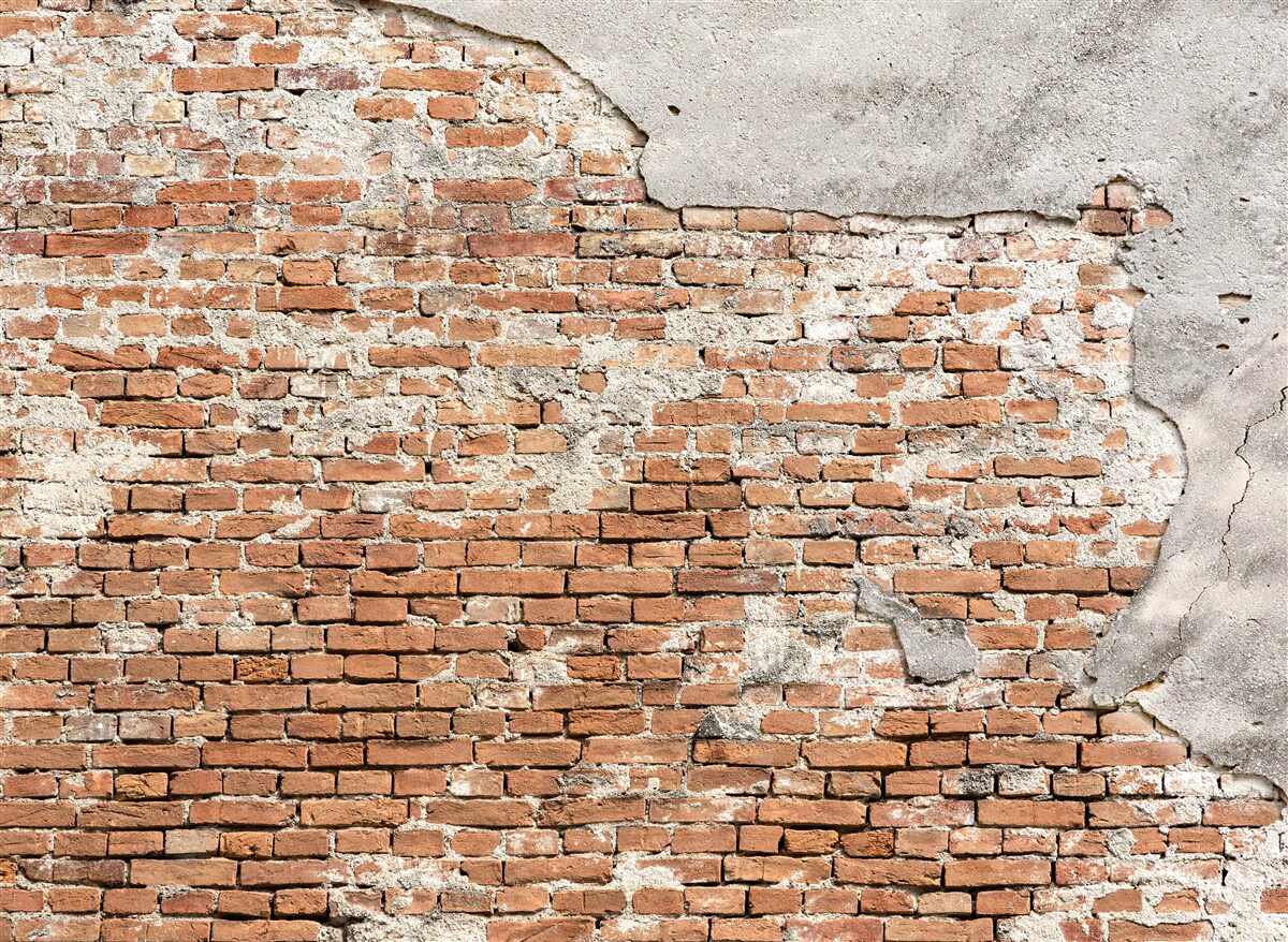 Fototapeten Teil der alten Ziegelbarriere