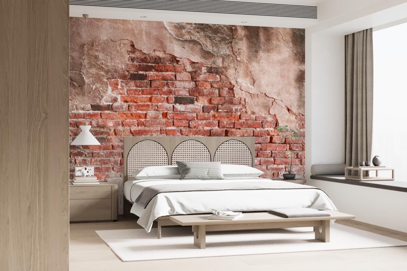 Fototapeten Eine mit zerkleinernde Ziegeln bedeckte Wand