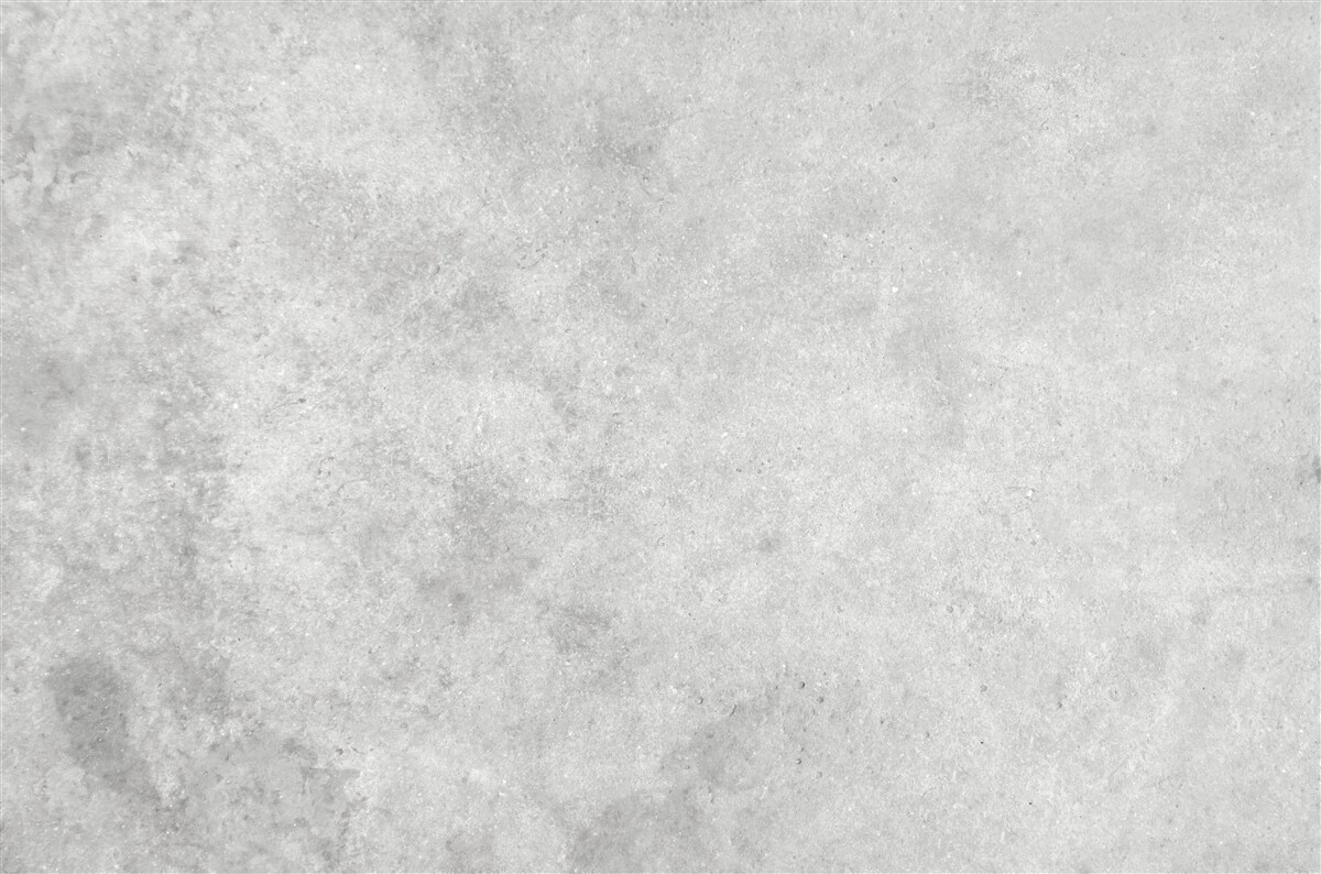 Fototapeten Die Wand besteht aus Beton in einem hellgrauen Schatten