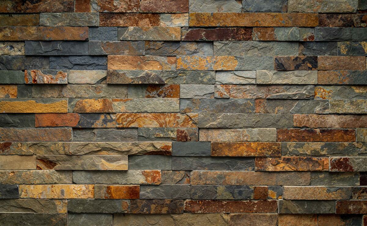 Fototapeten Multi-Rot-Wand aus Stein