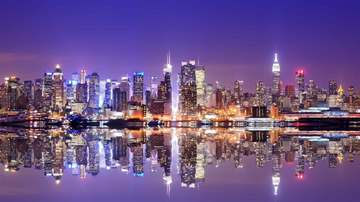 Fototapeten Megapolis mit Abendbeleuchtung