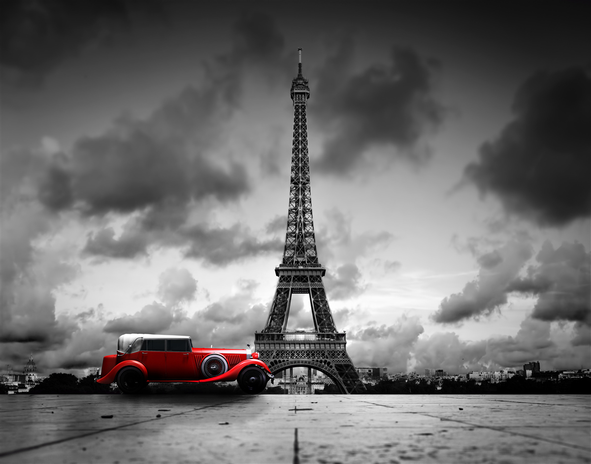 Fototapeten Roter Auto neben dem Eiffelturm