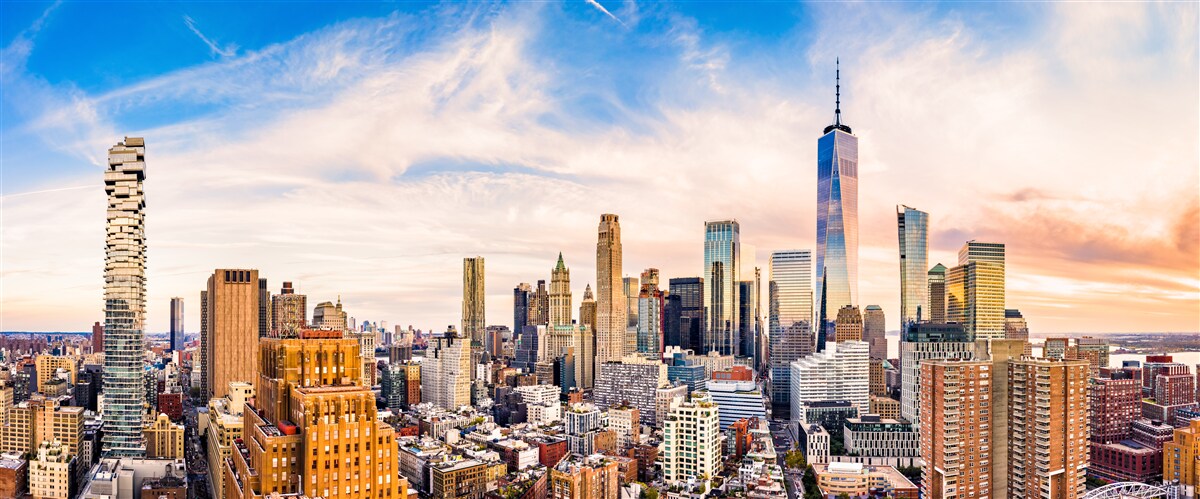 Fototapeten Sonnenuntergang über dem unteren Manhattan