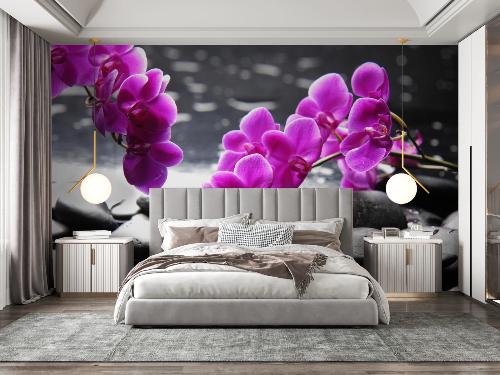 Fototapeten Eine Orchidee mit einem lila Farbton, eingebettet auf matte schwarze Steine