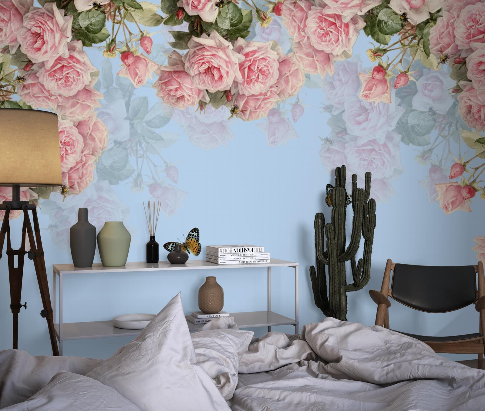 Fototapeten Es gibt rosa Rosen auf dem blauen Hintergrund