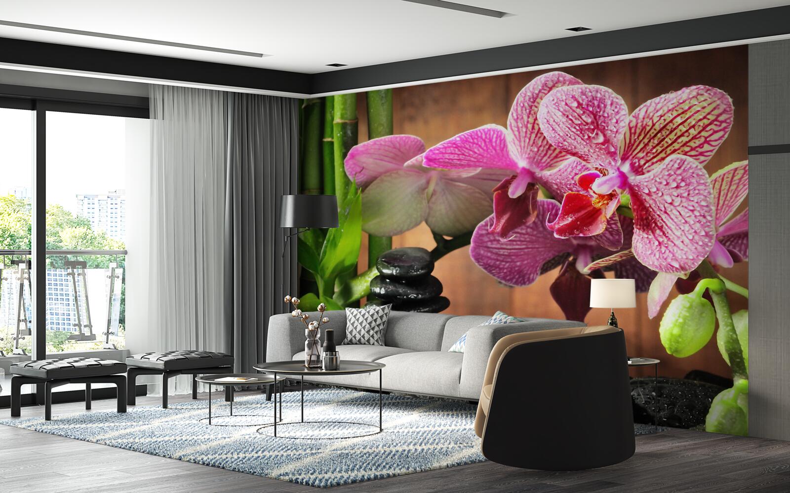 Fototapeten Purpurrote Orchidee zwischen Steinen