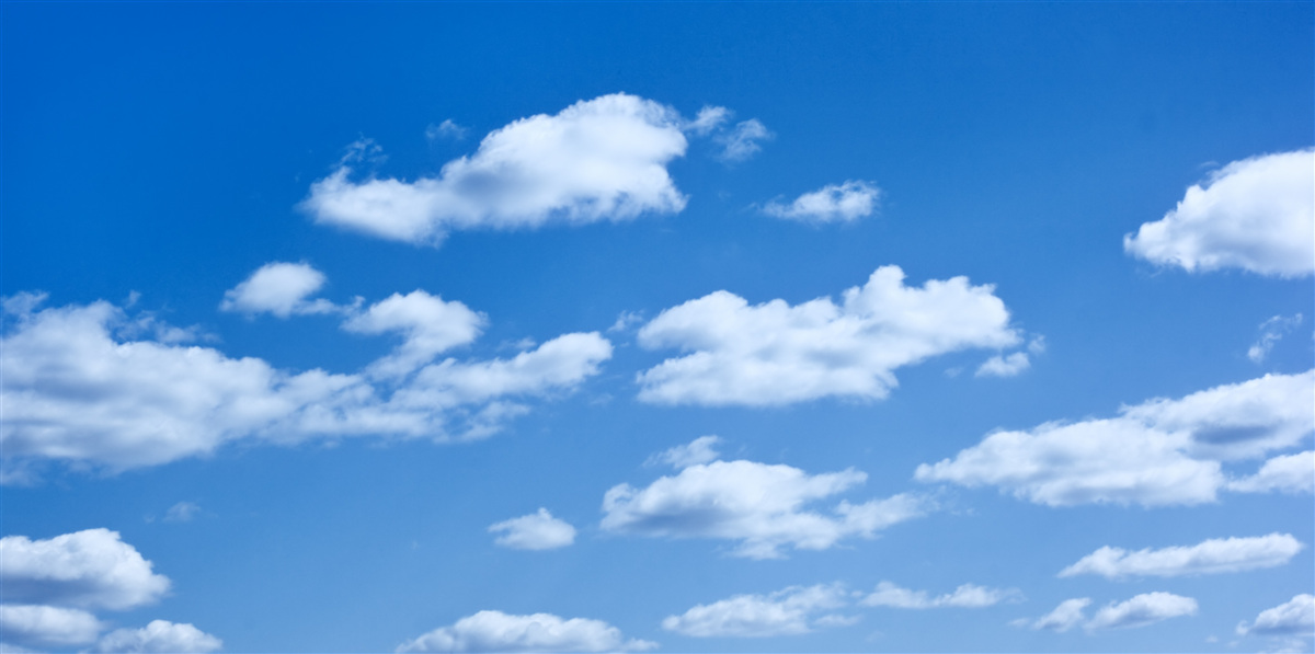Fototapeten Weiße Wolken schweben am blauen Himmel