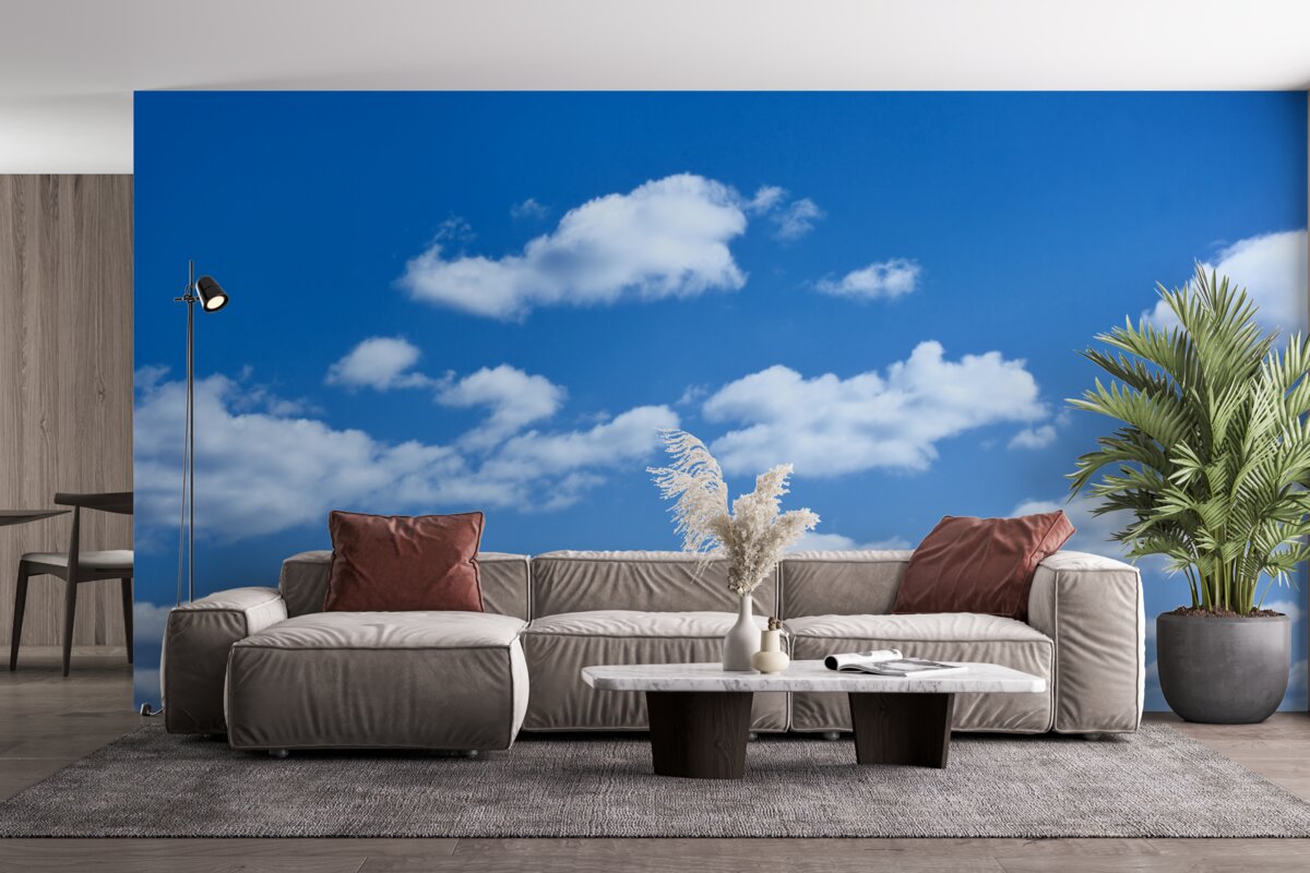 Fototapeten Weiße Wolken schweben am blauen Himmel