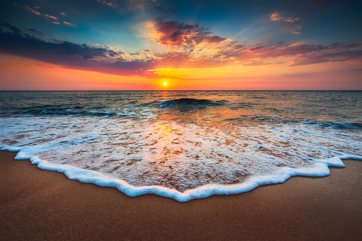 Fototapeten Sonnenuntergang über dem Meer