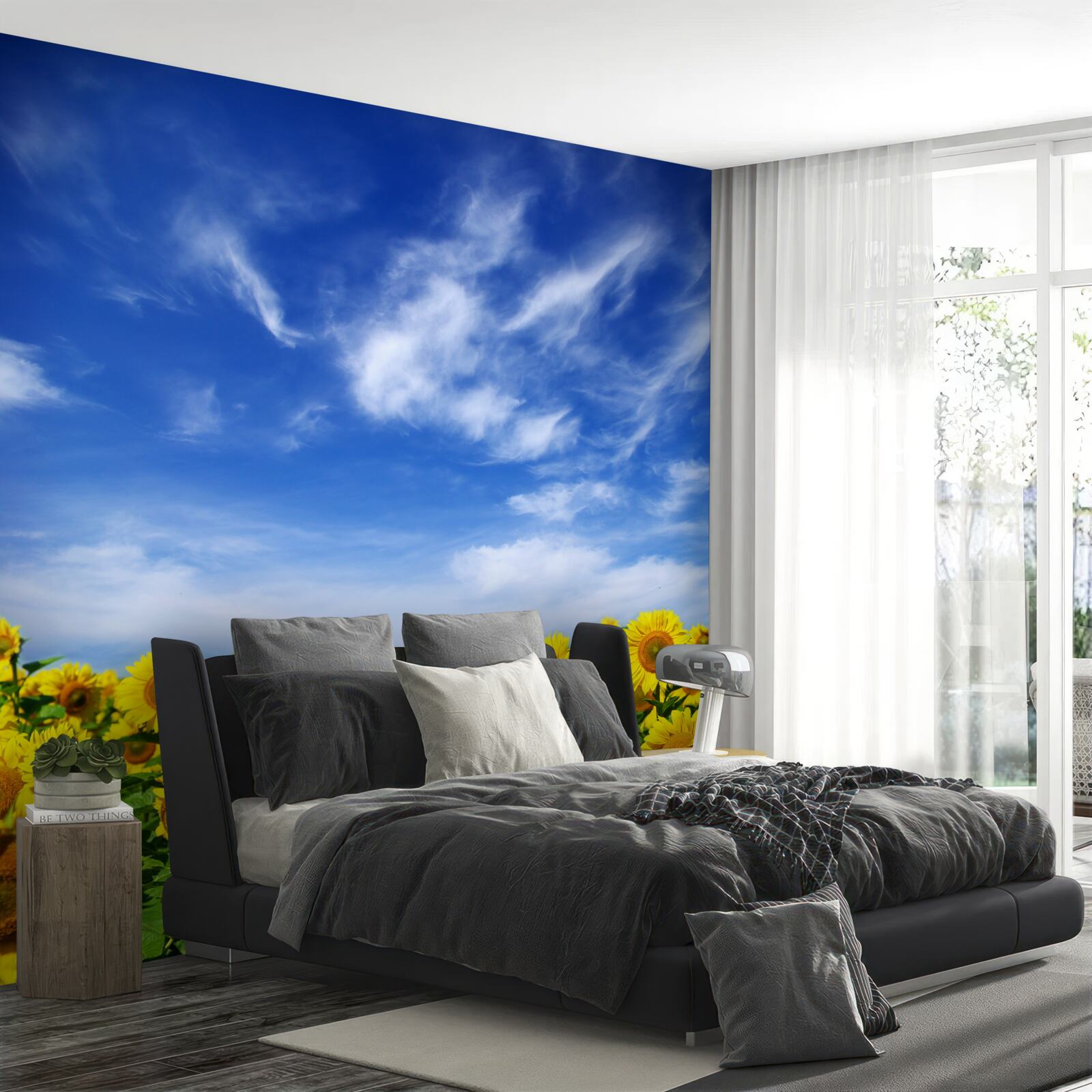 Fototapeten Sonnenblumen heben sich deutlich vom blauen Himmel ab