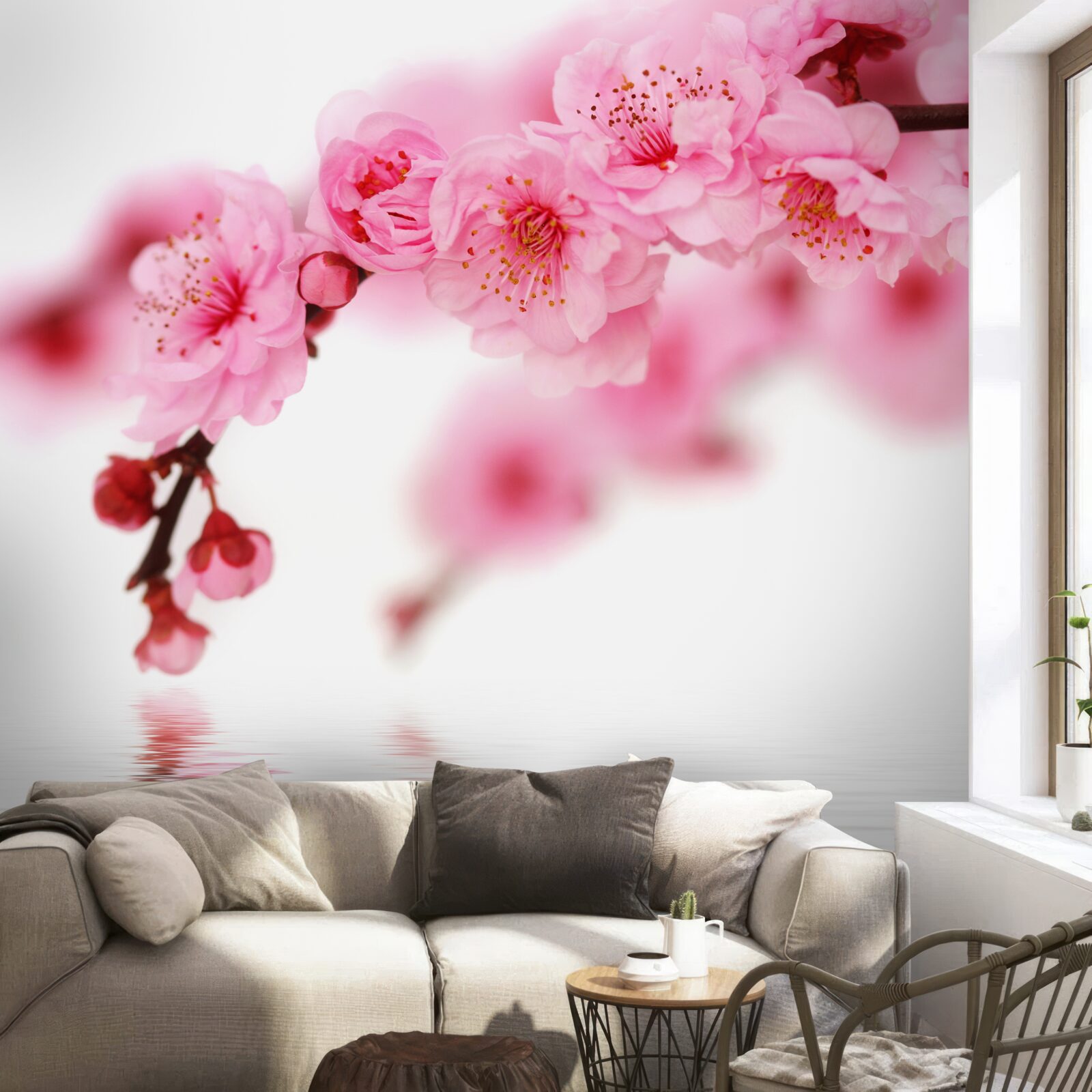 Fototapeten Der rosa Zweig von Sakura liegt in der Nähe des Wassers