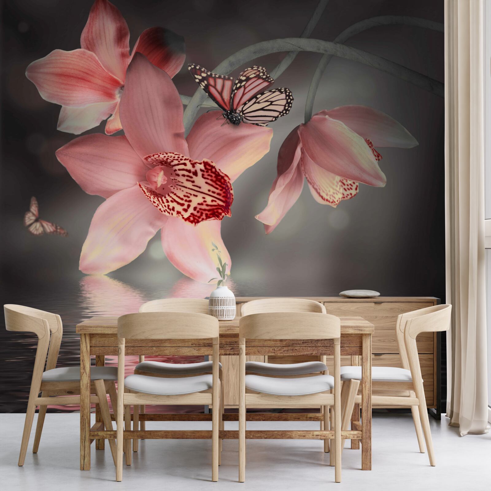 Fototapeten Eine rosa Orchidee hängt über der Wasseroberfläche
