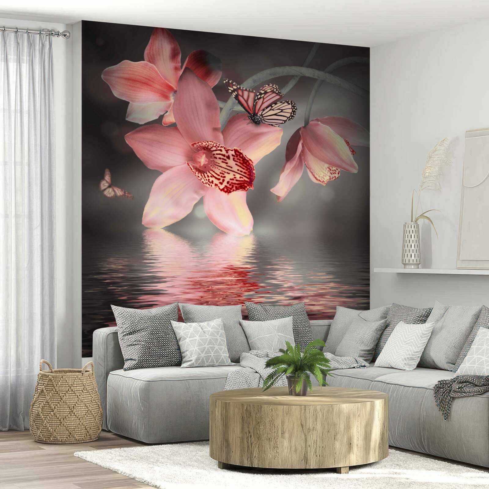 Fototapeten Eine rosa Orchidee hängt über der Wasseroberfläche