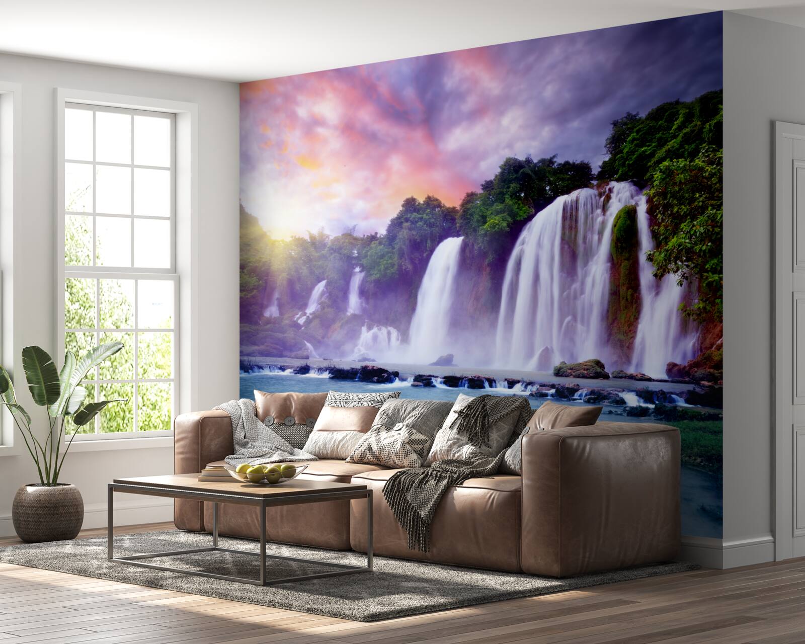 Fototapeten Ein riesiger Wasserfall fällt mit einer Kaskade vor dem Hintergrund der untergehenden Sonne