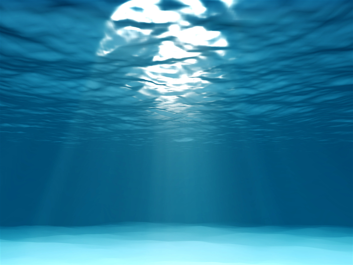 Fototapeten Die Sonnenstrahlen durchdringen die Tiefen des Wassers