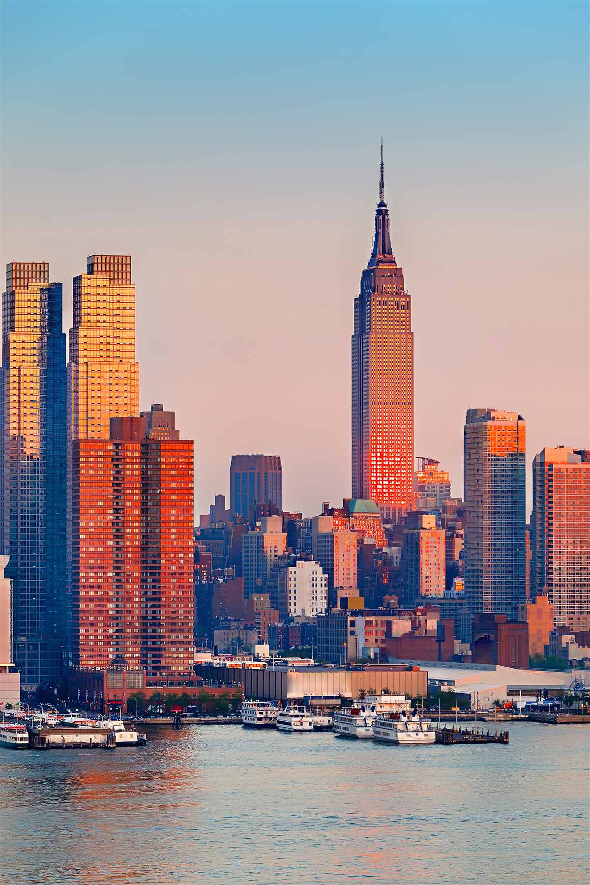 Fototapeten Der Sonnenuntergang fällt auf New York