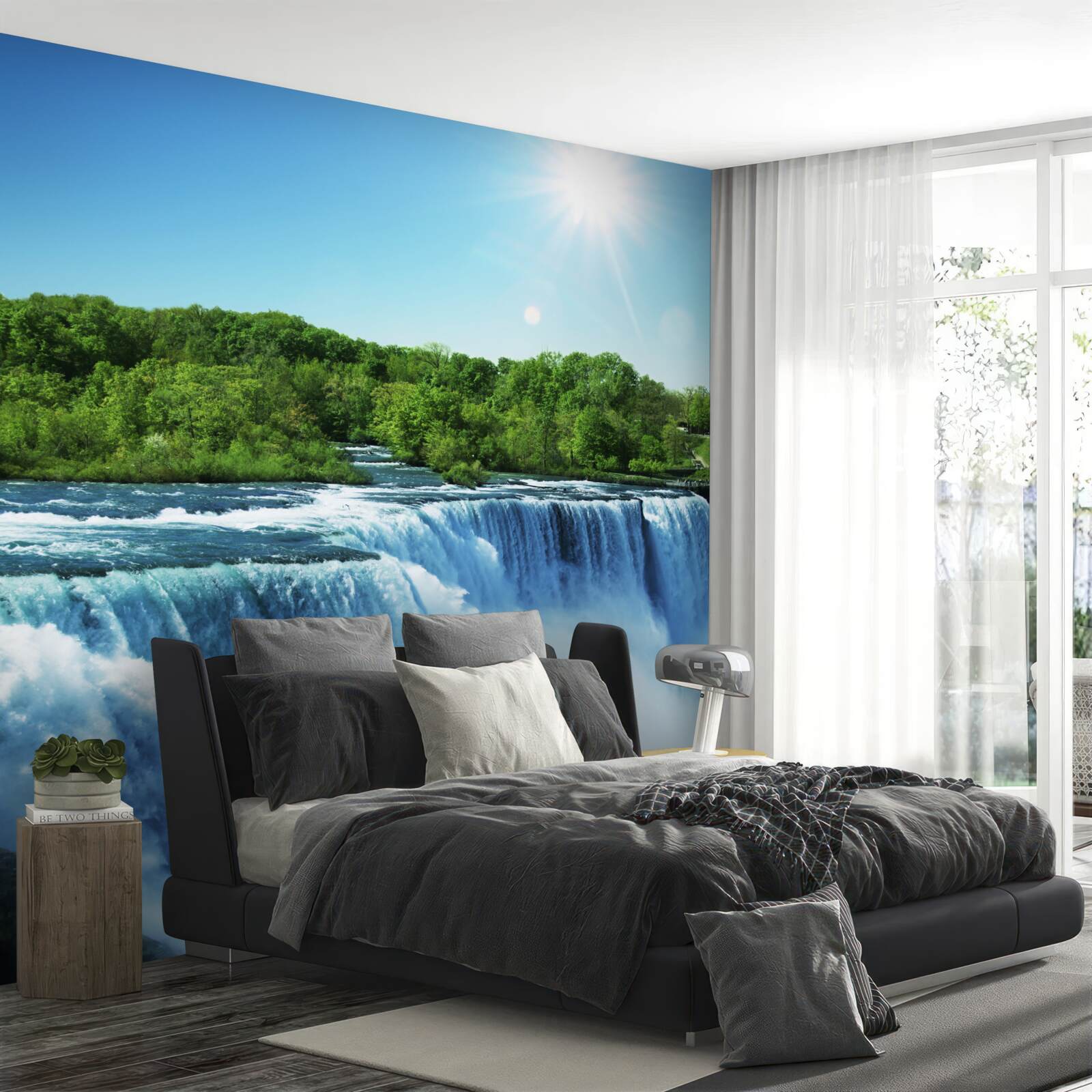 Fototapeten Die Kraft eines schnell fallenden großen Wasserfalls