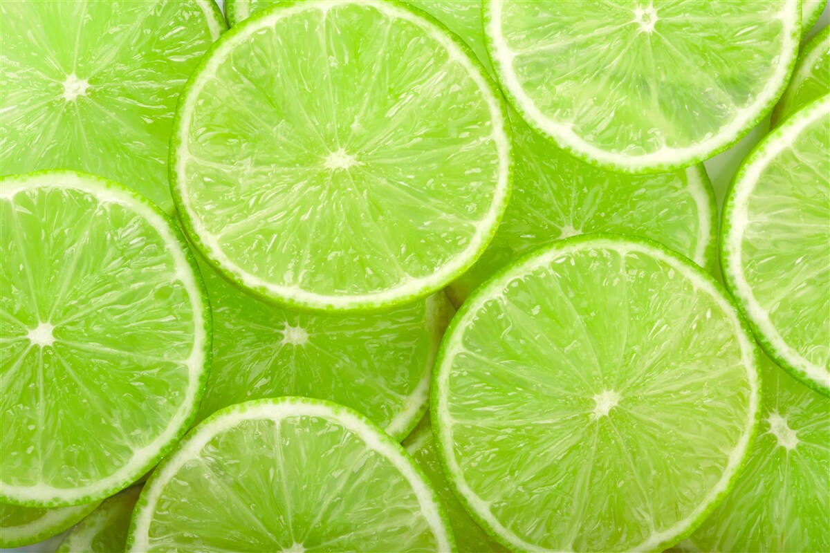 Fototapeten reife Limettenstücke
