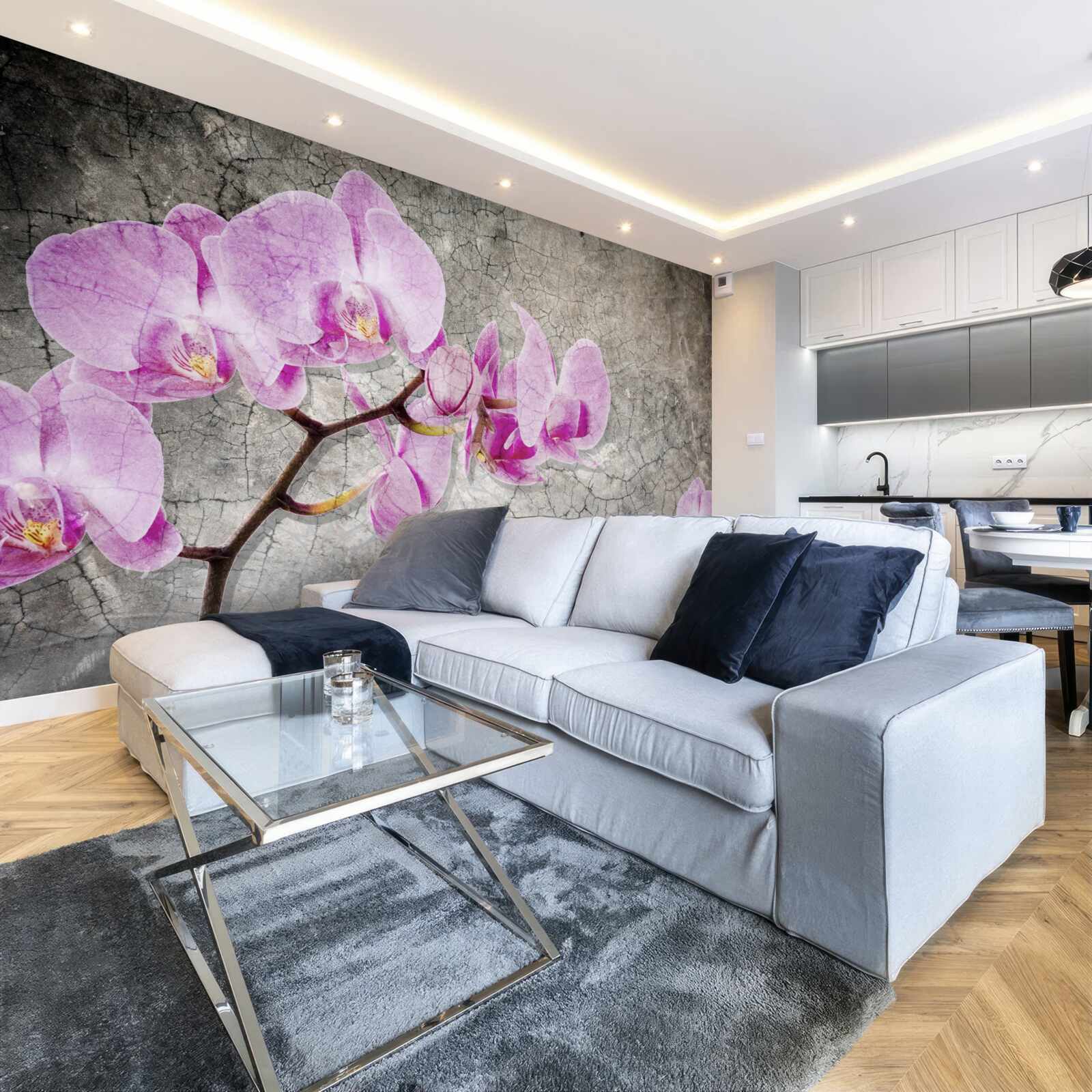 Fototapeten Zweige von Flila Orchidee auf grauem Hintergrund