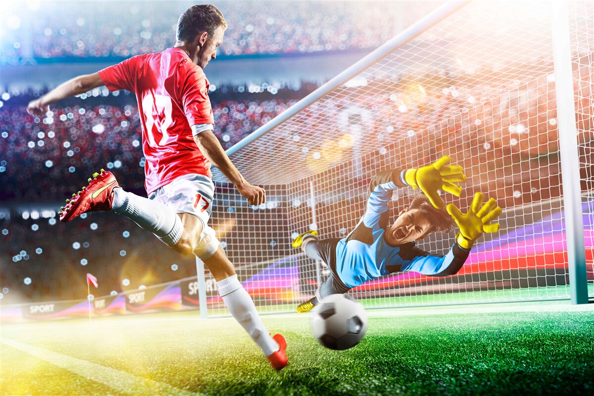 Fototapeten Der Spieler schießt auf das Tor