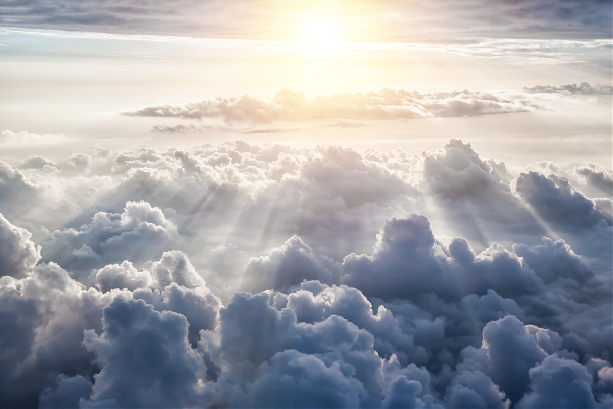 Fototapeten Das Licht war hoch über üppigen Wolken