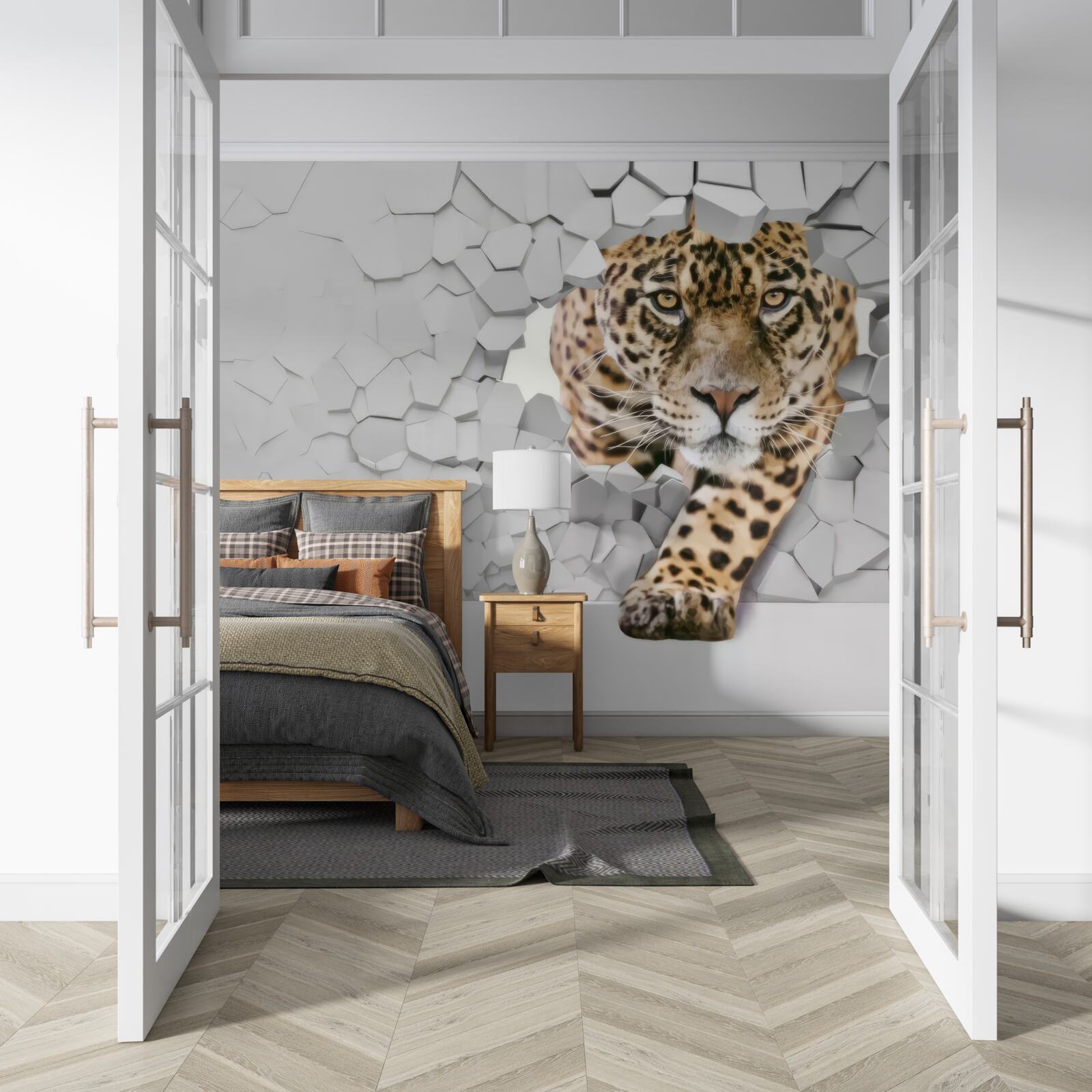Fototapeten Ein Leoparden taucht aus der weißen Wand auf