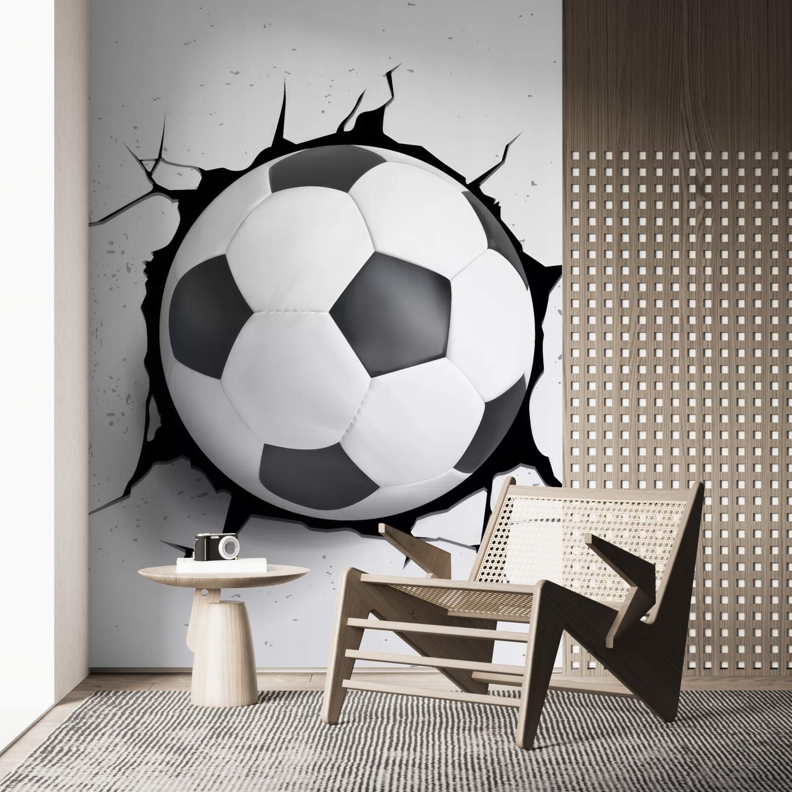 Fototapeten Fußball ragt aus der Wand heraus