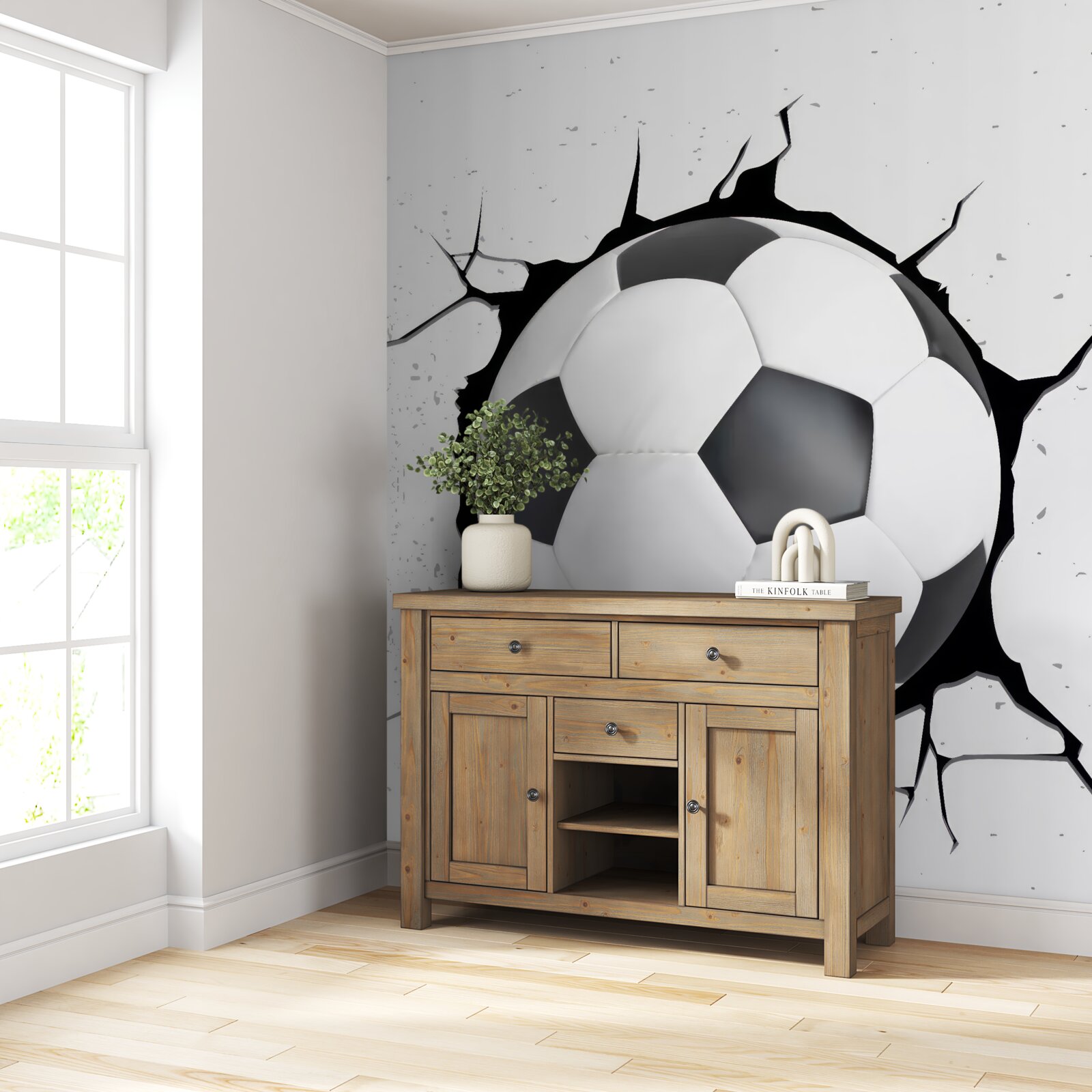 Fototapeten Fußball ragt aus der Wand heraus
