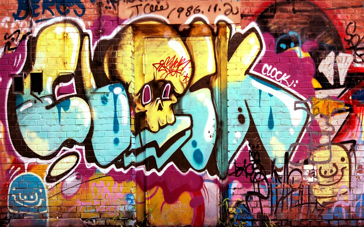 Fototapeten Graffiti mit einer hellen Inschrift